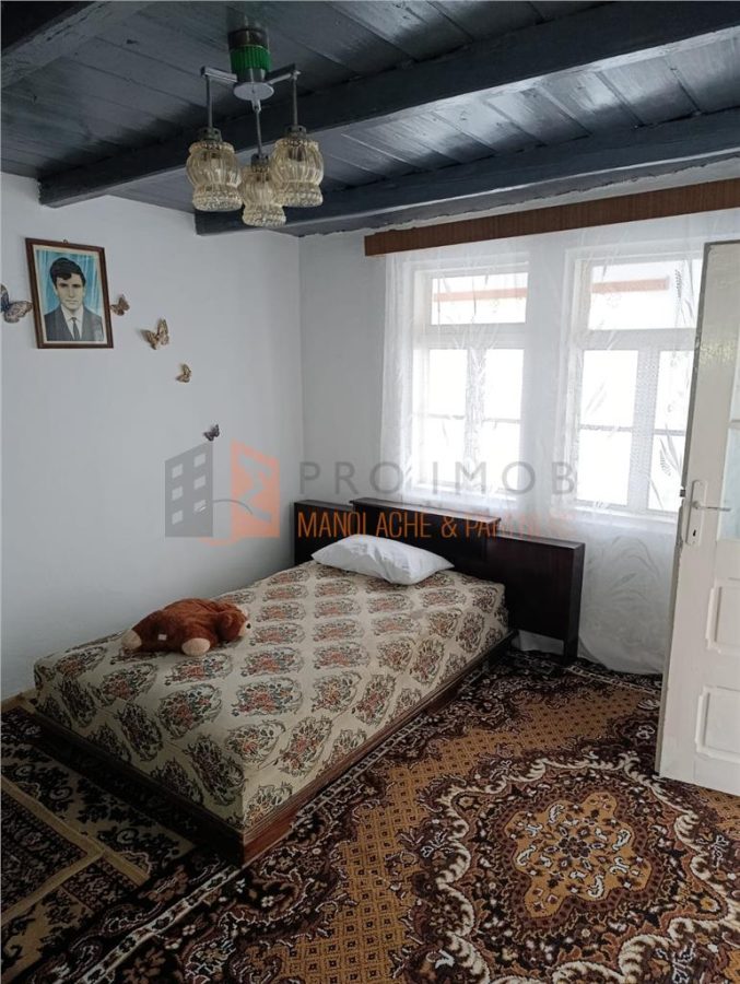 Casa tip parter zona Sarata Monteoru - foto 11