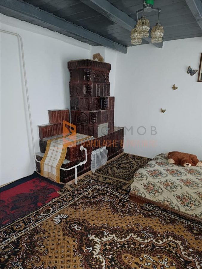 Casa tip parter zona Sarata Monteoru - foto 13