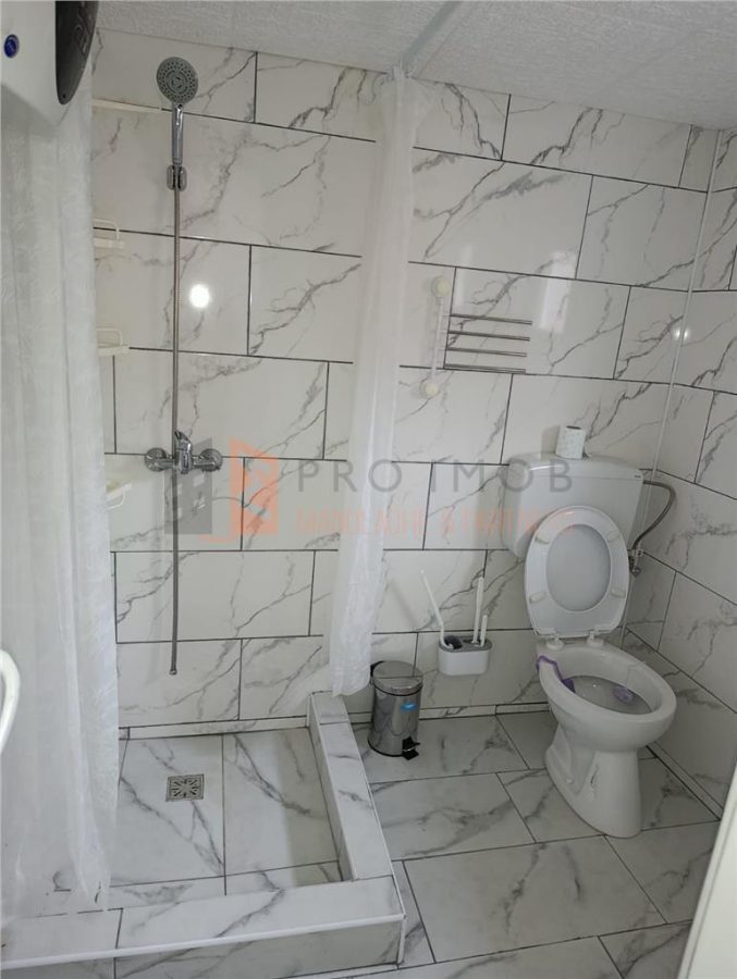 Casa tip parter zona Sarata Monteoru - foto 17