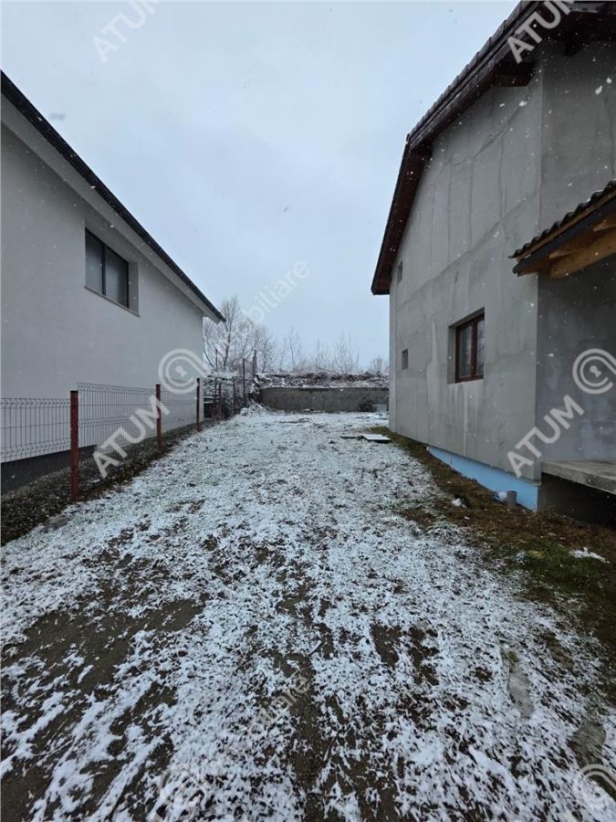 Casa cu 5 camere decomandate pe teren de 390 mp in Cisnadie Sibiu - foto 8