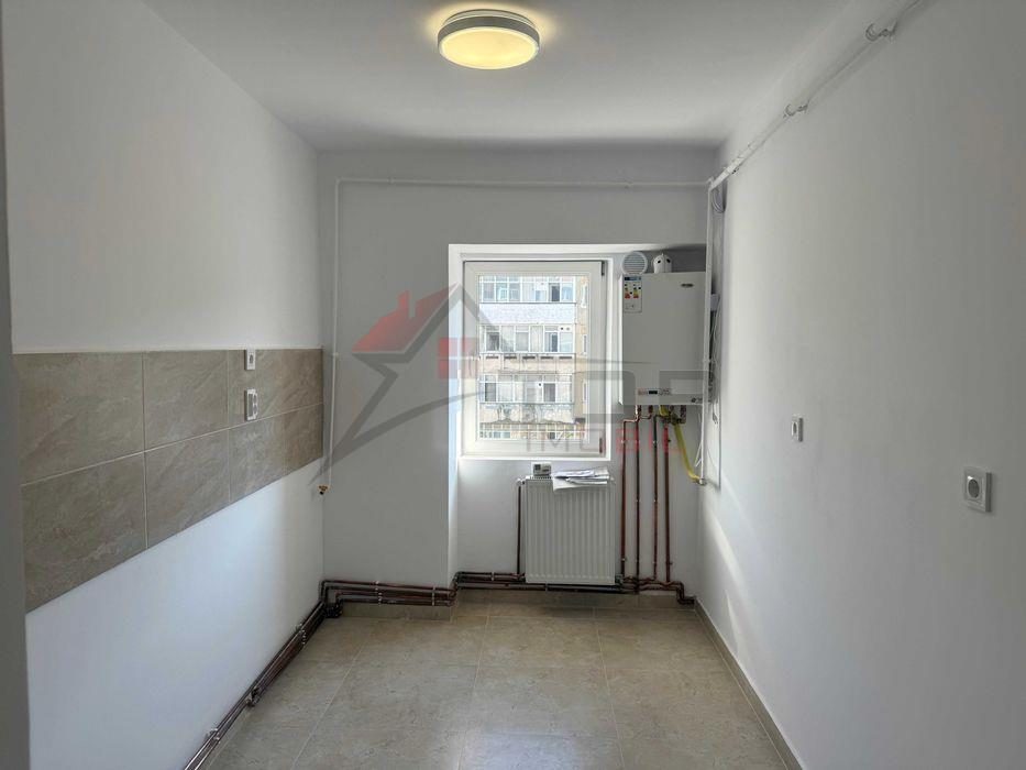 Dacia - la bulevard 2 camere decomandat, etaj intermediar, liber - foto 4