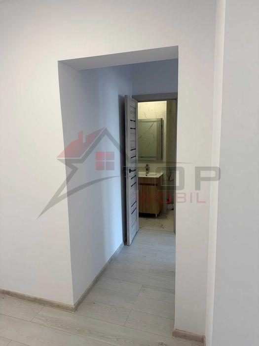 Dacia - la bulevard 2 camere decomandat, etaj intermediar, liber - foto 7