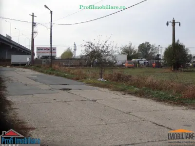 Teren 5.000 mp pentru diverse activitati cu acces din sosea strada Ovidiu in fata la CET Arad - foto 7