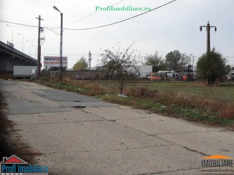Teren 5.000 mp pentru diverse activitati cu acces din sosea strada Ovidiu in fata la CET Arad - foto 7