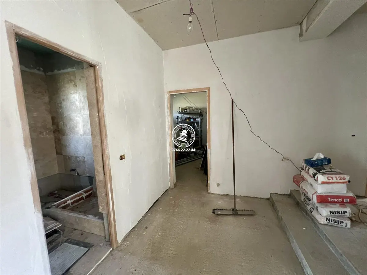 Vila cu 3 camere, 2 bai si 1000mp de teren de vanzare - foto 6