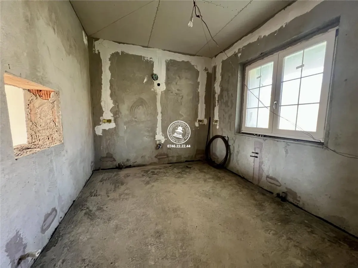 Vila cu 3 camere, 2 bai si 1000mp de teren de vanzare - foto 8