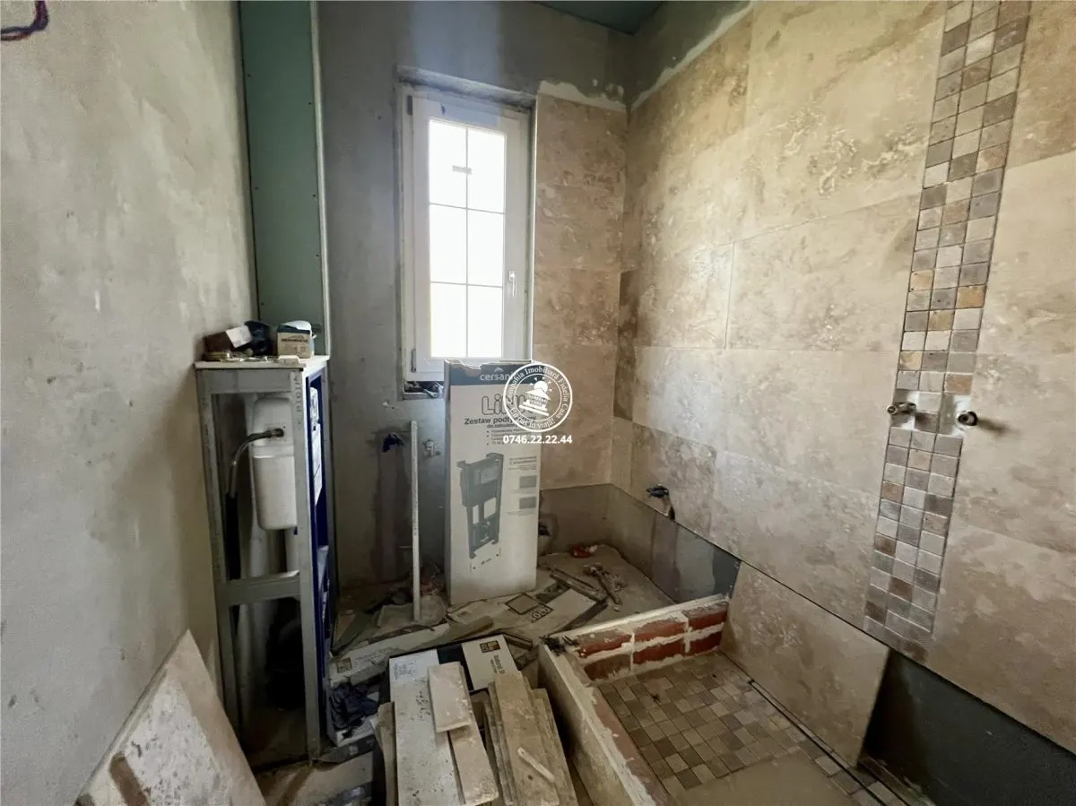 Vila cu 3 camere, 2 bai si 1000mp de teren de vanzare - foto 9