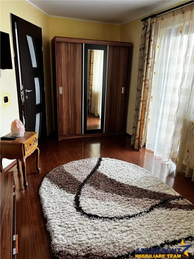Casa ce imbina eleganta cu functionalitatea, confort pe infrastructura locala - foto 6
