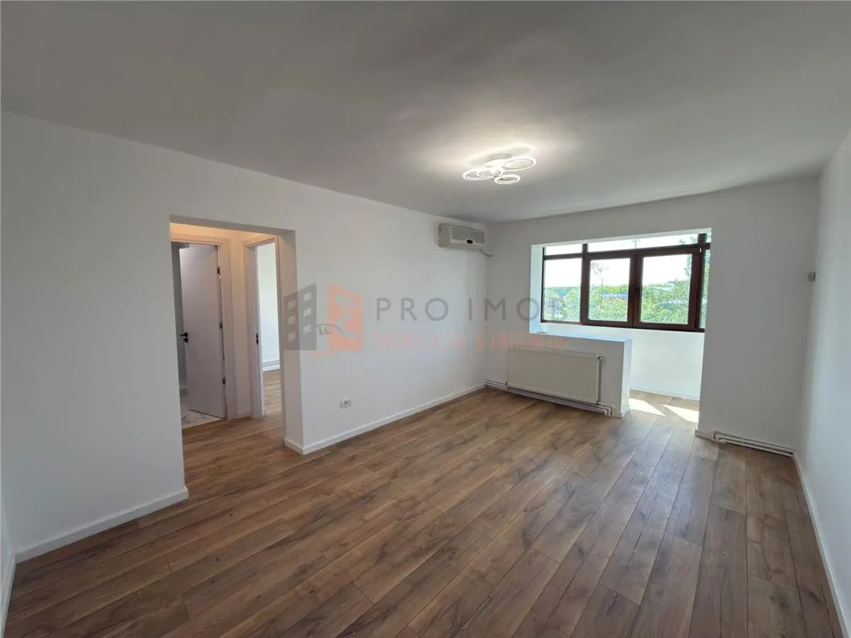 Apartament 2 camere cf 1 semidecomandat zona Crang - foto 2
