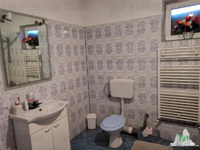 Vila cu etaj in Adunatii Copaceni, p+1+ pod + garaj + anexe, 5 camere, teren 1000mp - foto 8